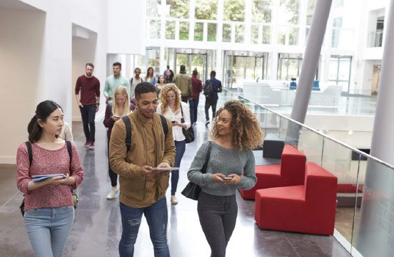 Students Walking Around University Campus