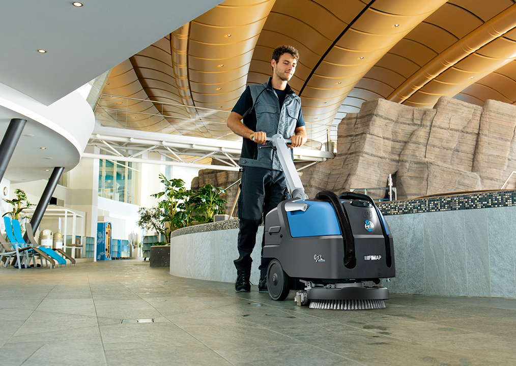 Male Worker Using GXL Floor Cleaner