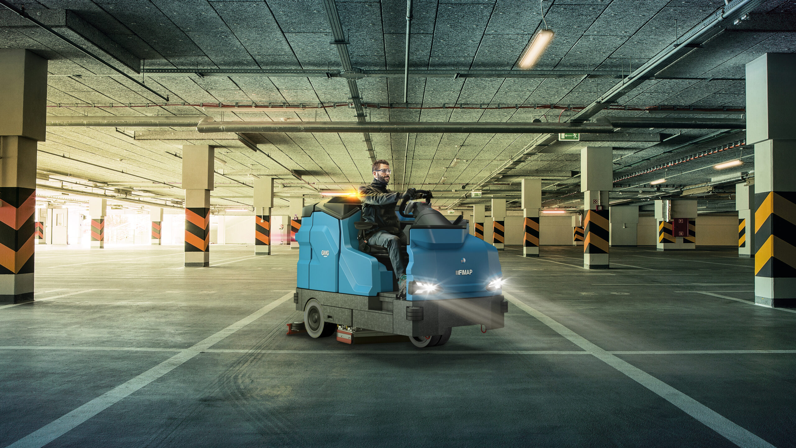 http://Man%20Using%20GMG%20Machine%20In%20Carpark