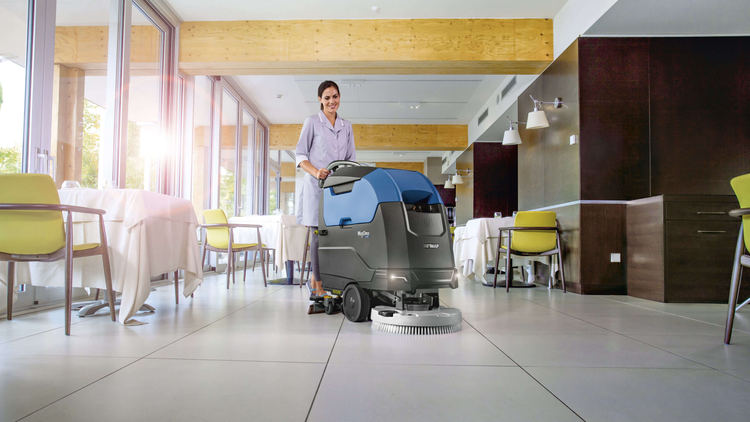 http://Woman%20Using%20Maxima%2050%20Floor%20Cleaning%20Machine%20In%20Restaurant